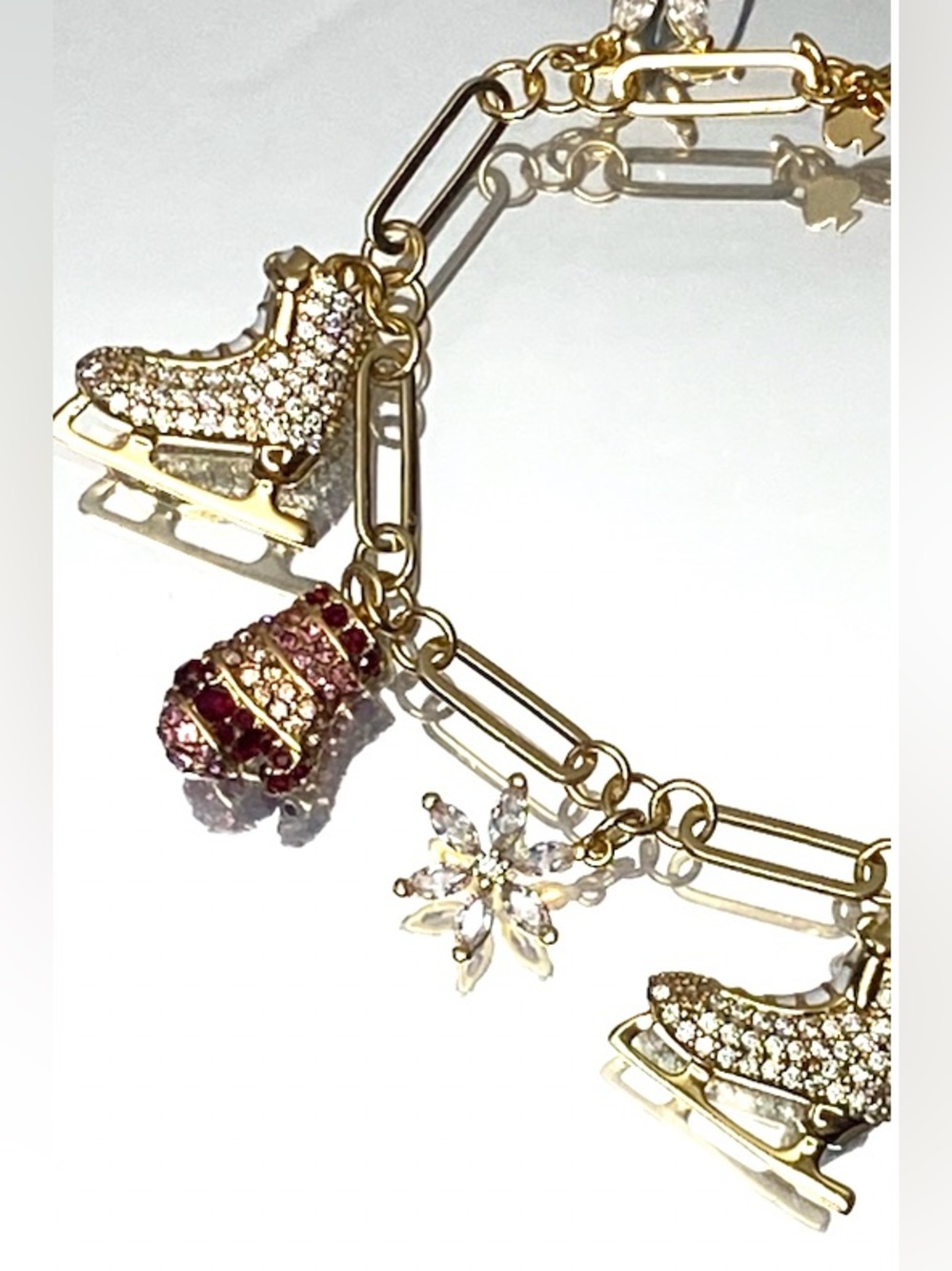 kate spade Gold-Tone Ice Skate & Snowflake Charm Bracelet with Pink Accents - Picture 8 of 9